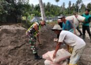 Babinsa Koramil 11/Bandar Baru Laksanakan Karya Bakti Bersama Warga Desa Jiem Jiem